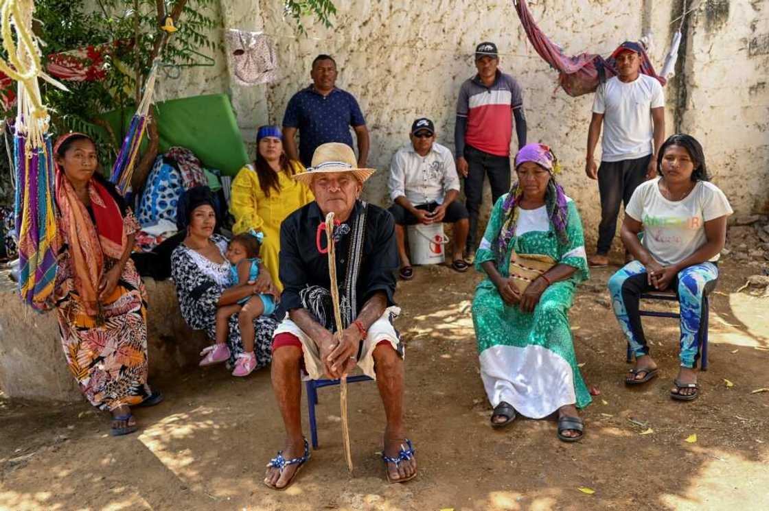 Moises Jusayu (C), a member of the Wayuu Indigenous community, says he has suffered violence and harassment since refusing to sell his land Moises Jusayu (C), a member of the Wayuu Indigenous community, says he has suffered violence and harassment since refusing to sell his land