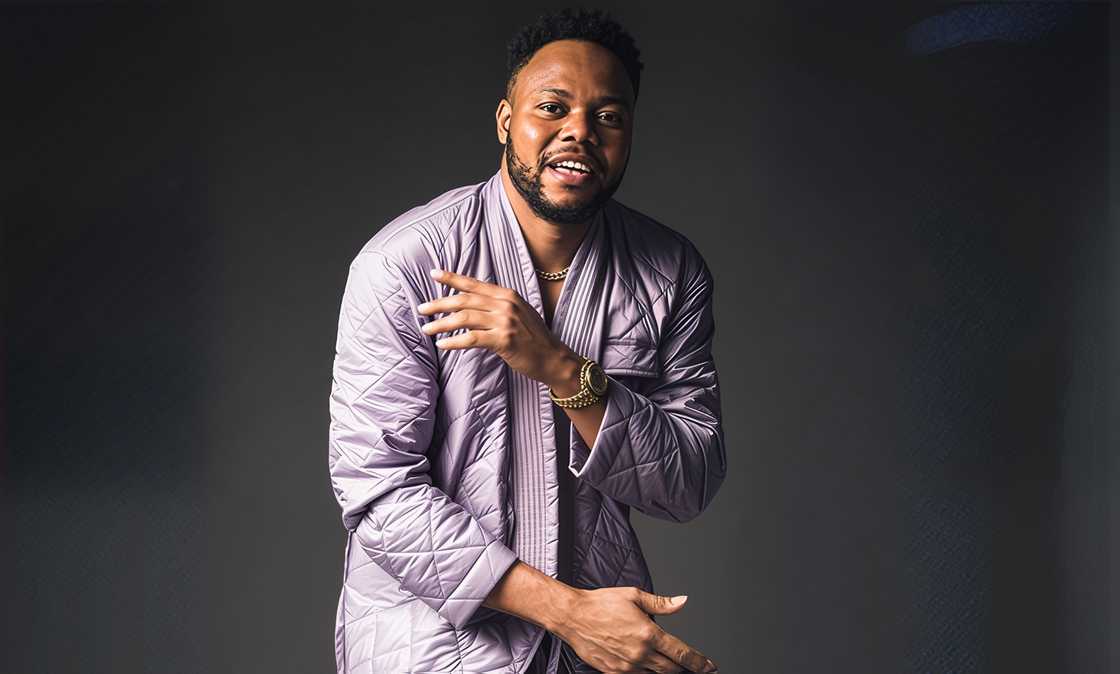 Francis Antetokounmpo poses in a purple outfit. Francis Antetokounmpo poses in a purple outfit.