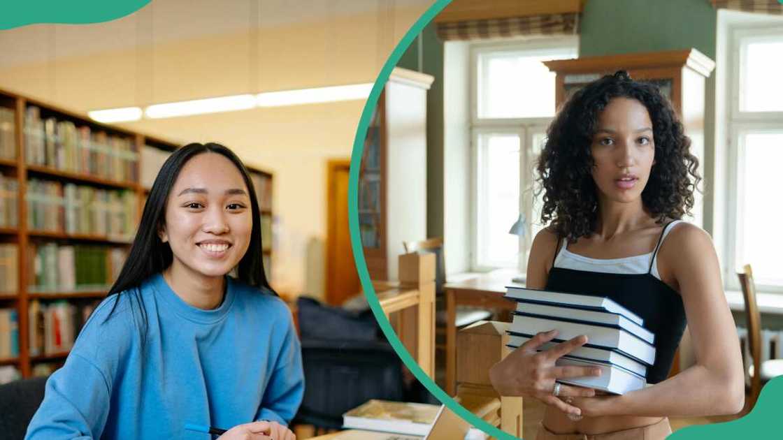 A student in the library studying and another one carring books A student in the library studying and another one carring books