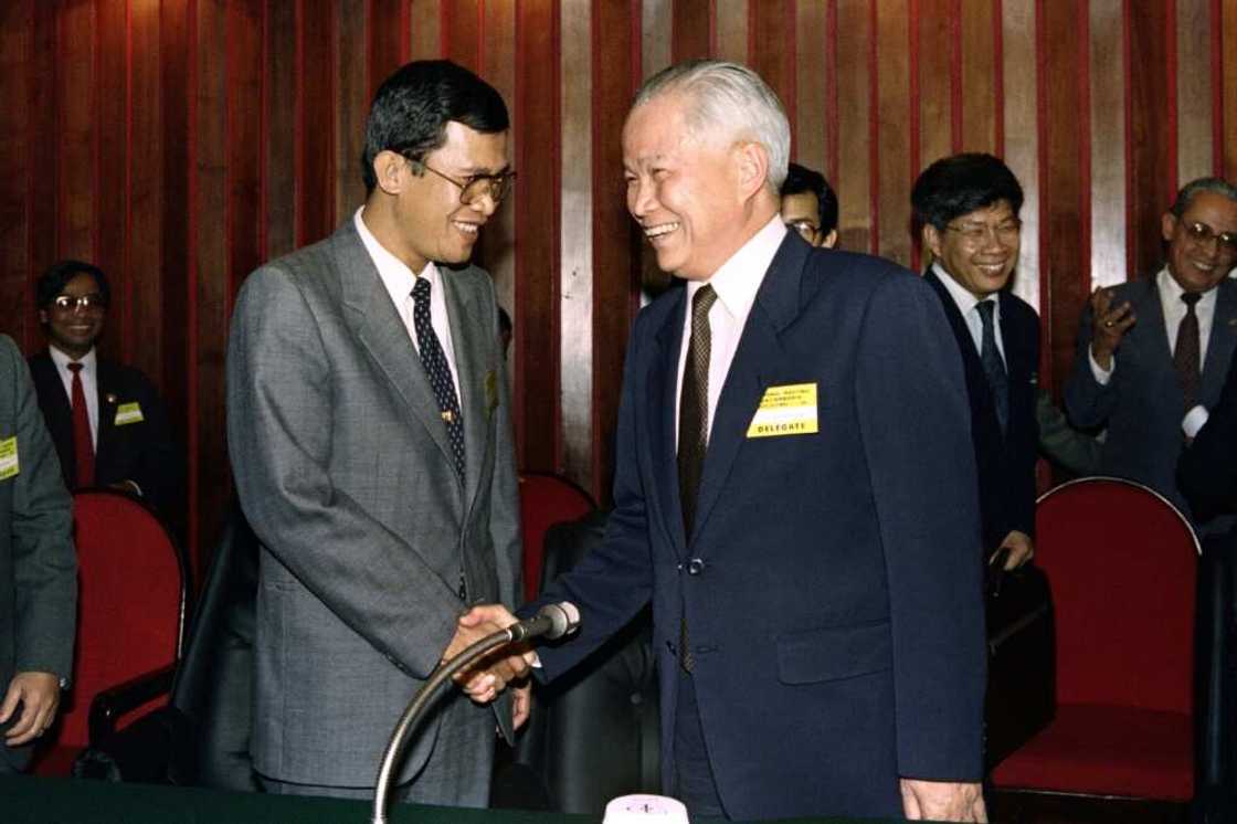 Prime Minister Hun Sen -- pictured here with Khieu Samphan in 1990 -- has repeatedly warned against broadening the scope of the trials Prime Minister Hun Sen -- pictured here with Khieu Samphan in 1990 -- has repeatedly warned against broadening the scope of the trials