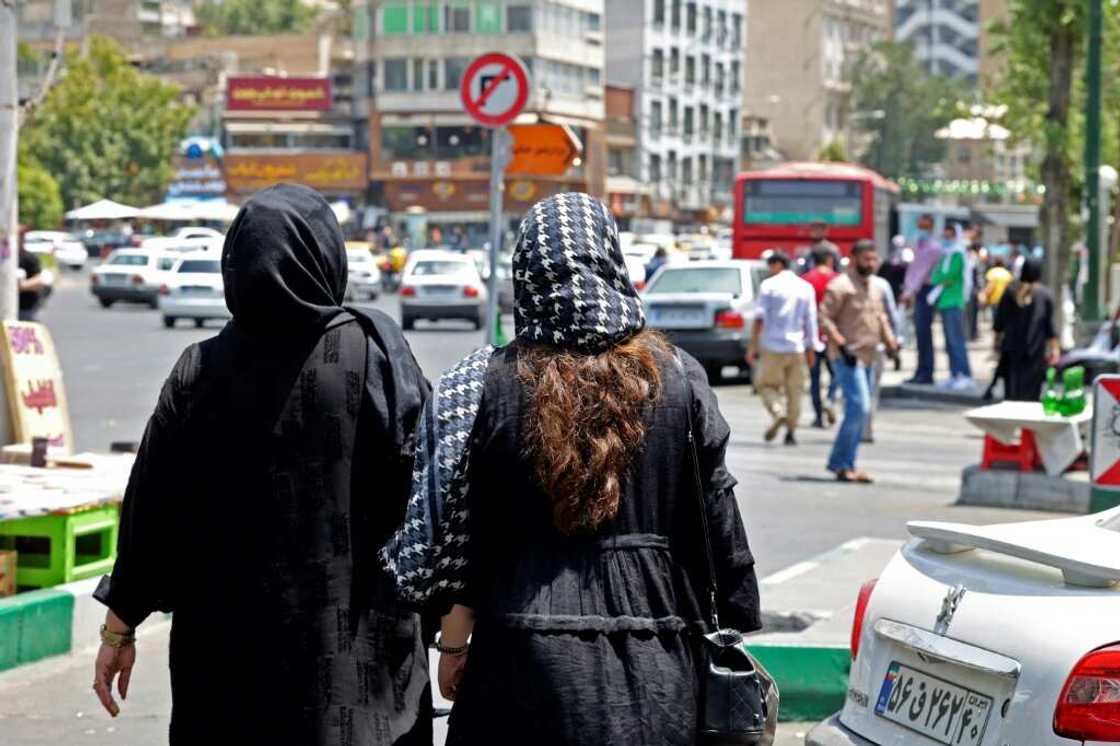 The Islamic hijab has been compulsory for women in Iran since shortly after the 1979 Islamic revolution The Islamic hijab has been compulsory for women in Iran since shortly after the 1979 Islamic revolution