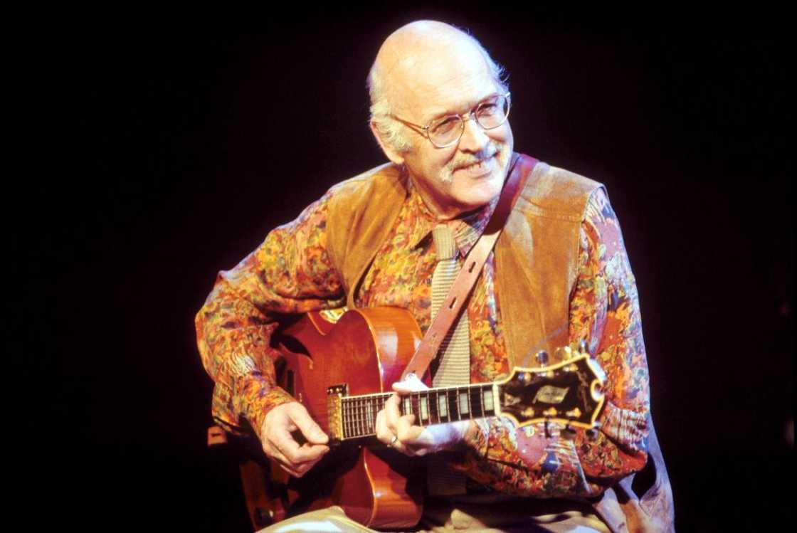 Jim Hall performs live on stage playing a D'Aquisto semi-acoustic archtop guitar