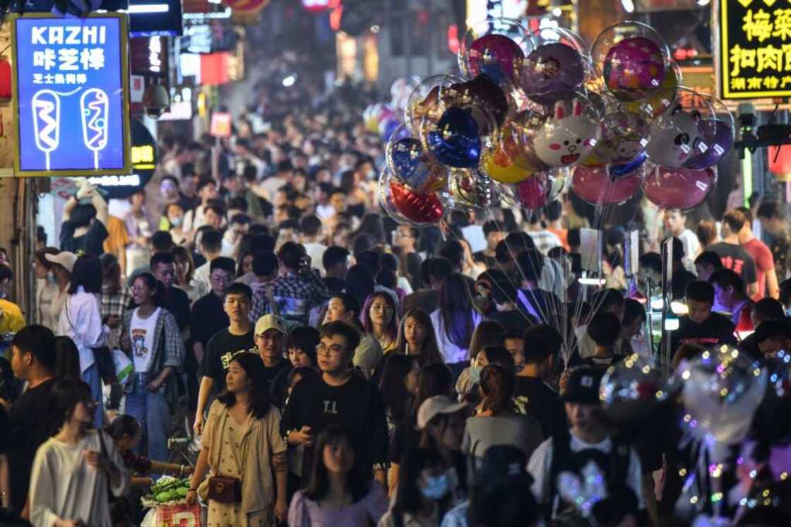 A crowded street is seen in the city of Changsha in China's Hunan province in September 2020 A crowded street is seen in the city of Changsha in China's Hunan province in September 2020