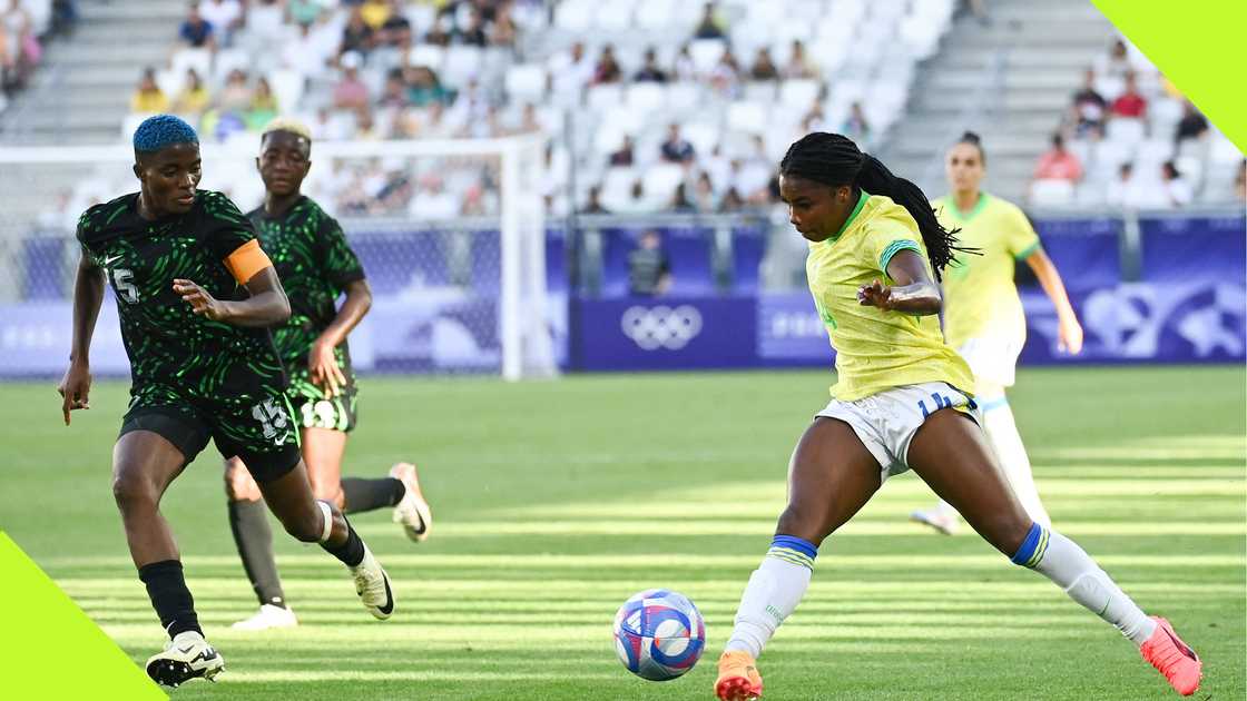 Rasheedat Ajibade duels for the ball against Ludmila. Rasheedat Ajibade duels for the ball against Ludmila.