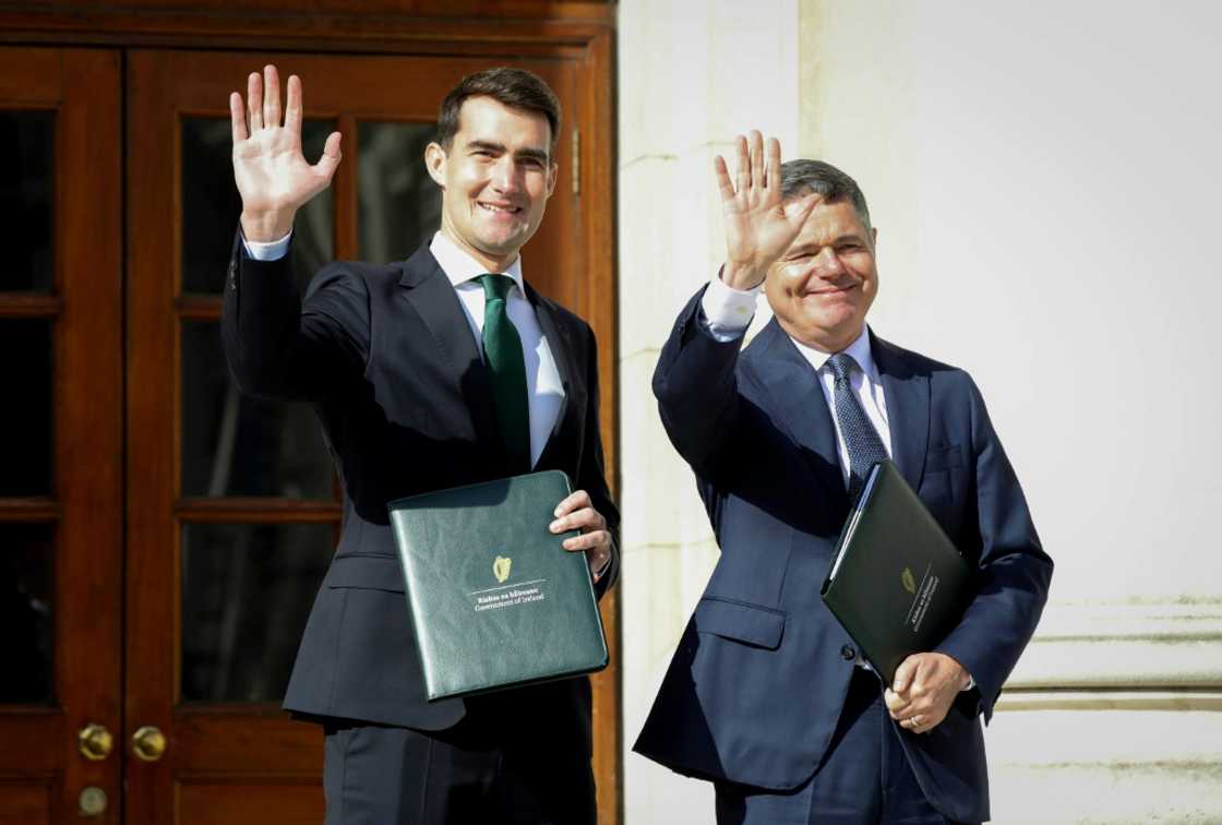 Ireland's Minister for Finance Jack Chambers (L) said the 2025 budget 'puts the country on a firm footing' Ireland's Minister for Finance Jack Chambers (L) said the 2025 budget 'puts the country on a firm footing'