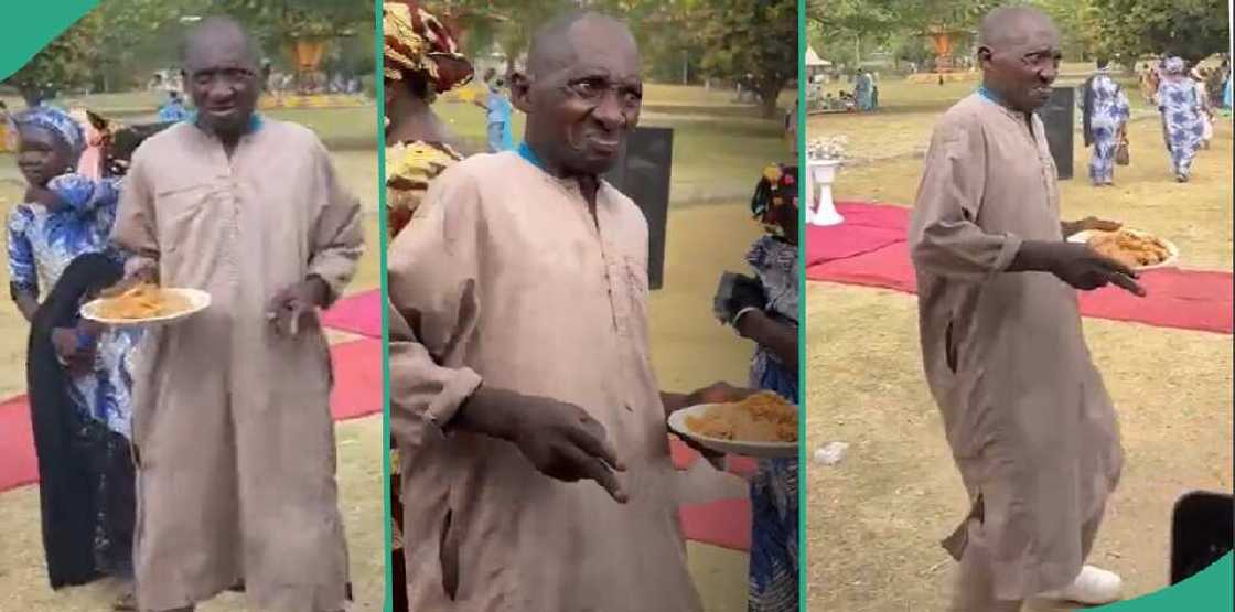 Man dances with plate of jollof rice.