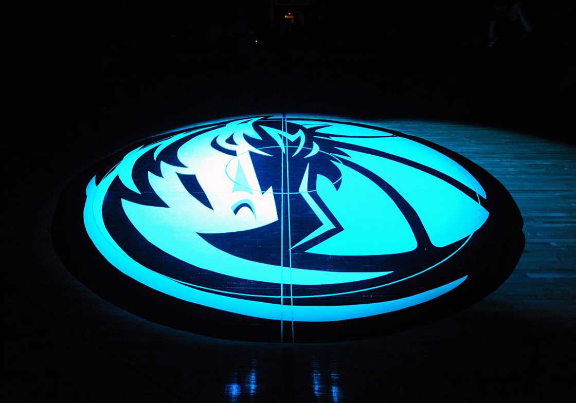 Dallas Mavericks logo on a court