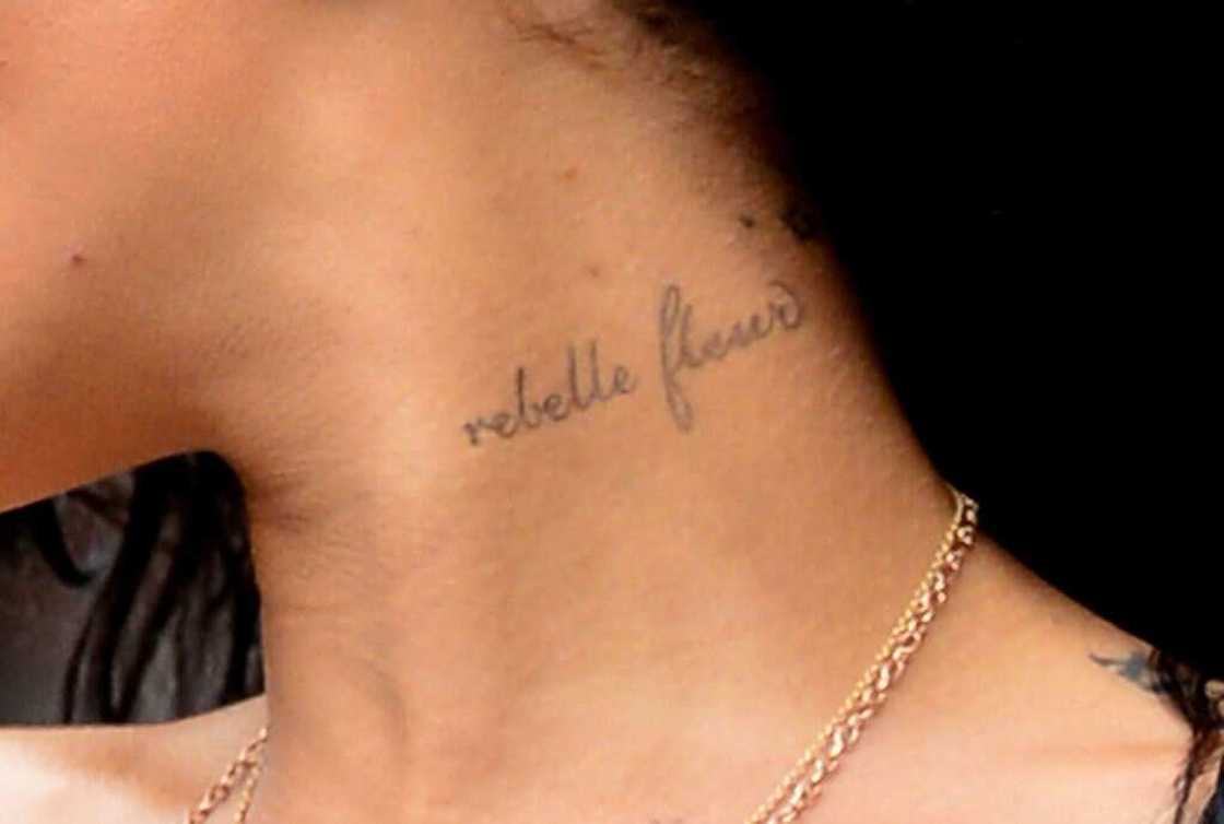 Rihanna neck's tattoos Rihanna neck's tattoos
