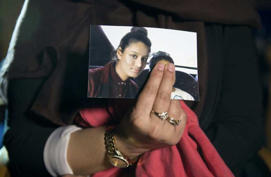 Begum's eldest sister Renu holds a photo of her as a teenager Begum's eldest sister Renu holds a photo of her as a teenager