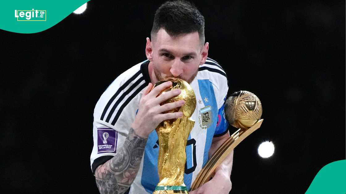 Lionel Messi kisses the FIFA World Cup trophy while holding the Golden Ball award at Lusail Stadium on December 18, 2022. Photo by Cui Nan Lionel Messi kisses the FIFA World Cup trophy while holding the Golden Ball award at Lusail Stadium on December 18, 2022. Photo by Cui Nan