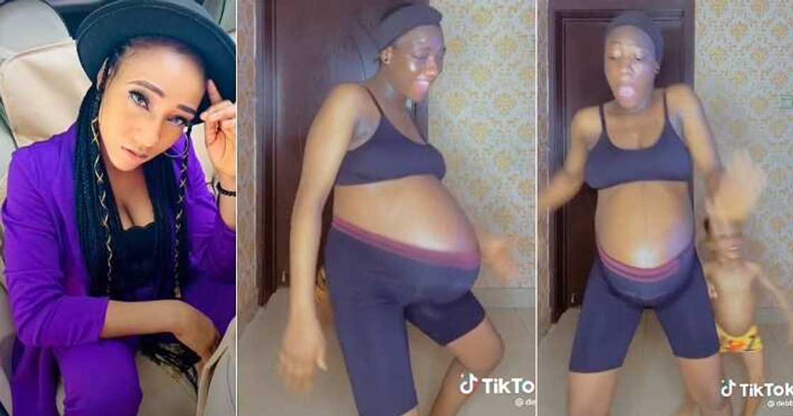 Pregnant woman dances with baby bump Pregnant woman dances with baby bump