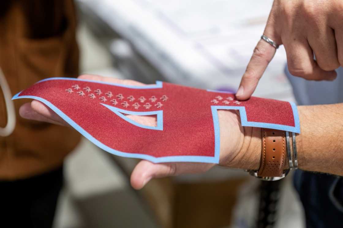 A laser-cut number is inspected at SP Apparel in Saint-Hyacinthe, Quebec, Canada, on September 27, 2024 A laser-cut number is inspected at SP Apparel in Saint-Hyacinthe, Quebec, Canada, on September 27, 2024