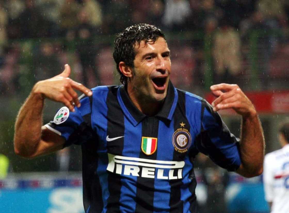 Luis Figo celebrates after scoring during the Serie A match between Inter Milan and Sampdoria