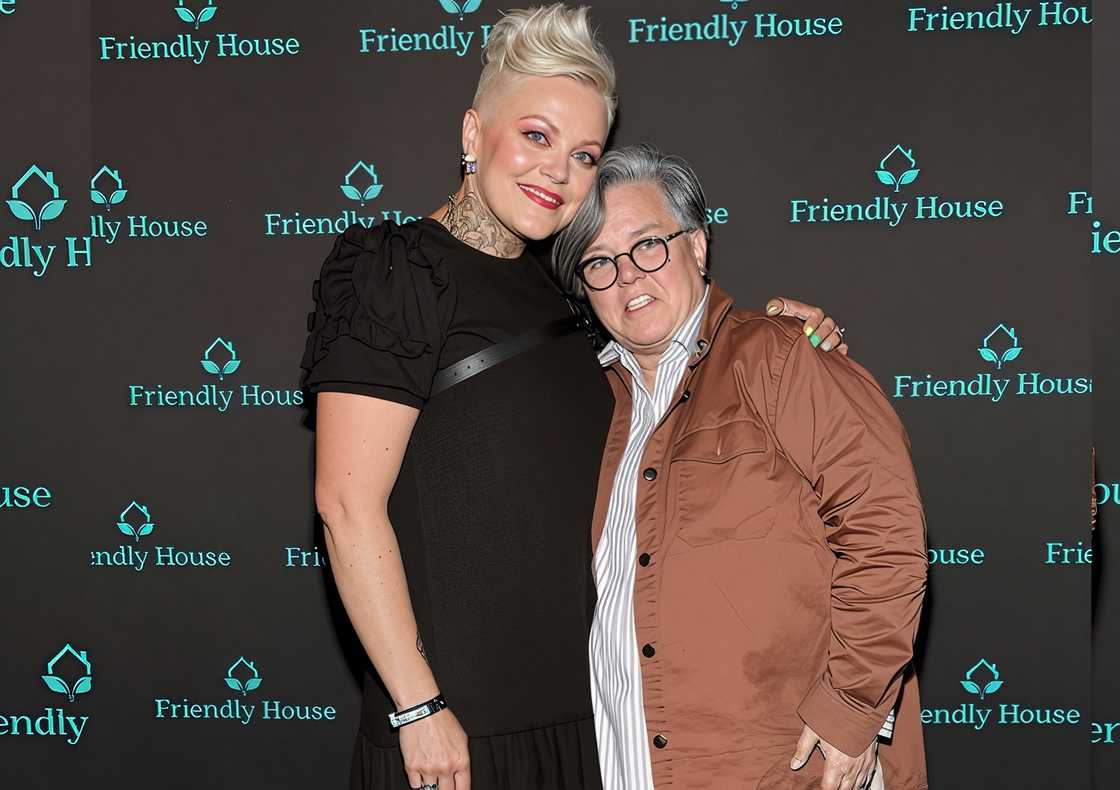 Aimee Hauer and Rosie O'Donnell pose on the red carpet of the Friendly House LA Comedy Benefit Aimee Hauer and Rosie O'Donnell pose on the red carpet of the Friendly House LA Comedy Benefit
