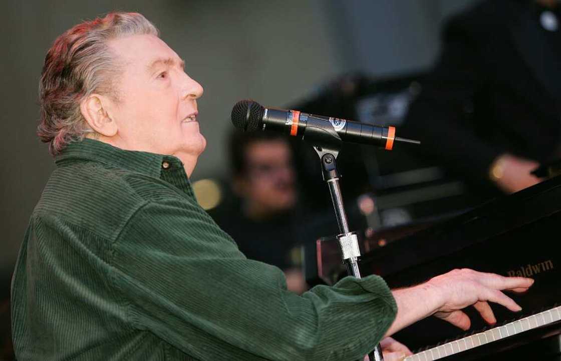 American music legend Jerry Lee Lewis -- seen here performing for fans in support of his album "Last Man Standing" in October 2006 in Hollywood -- was best known for his giant hit, "Great Balls of Fire" American music legend Jerry Lee Lewis -- seen here performing for fans in support of his album "Last Man Standing" in October 2006 in Hollywood -- was best known for his giant hit, "Great Balls of Fire"