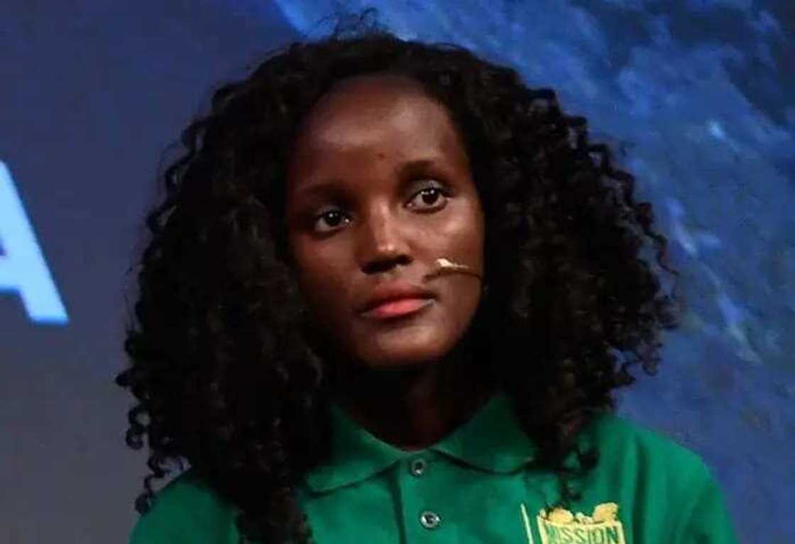 Ugandan climate activist edited out of photo with whites Ugandan climate activist edited out of photo with whites