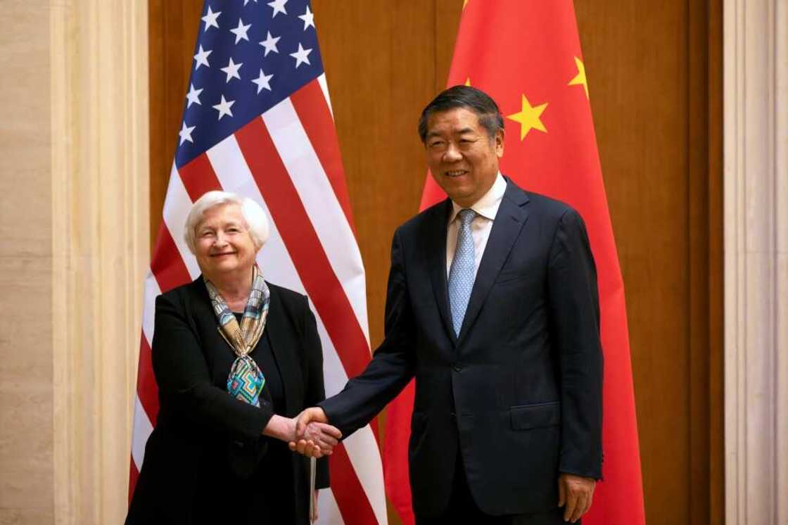 US Treasury Secretary Janet Yellen (L) shakes hands with Chinese Vice Premier He Lifeng during a a visit to Beijing