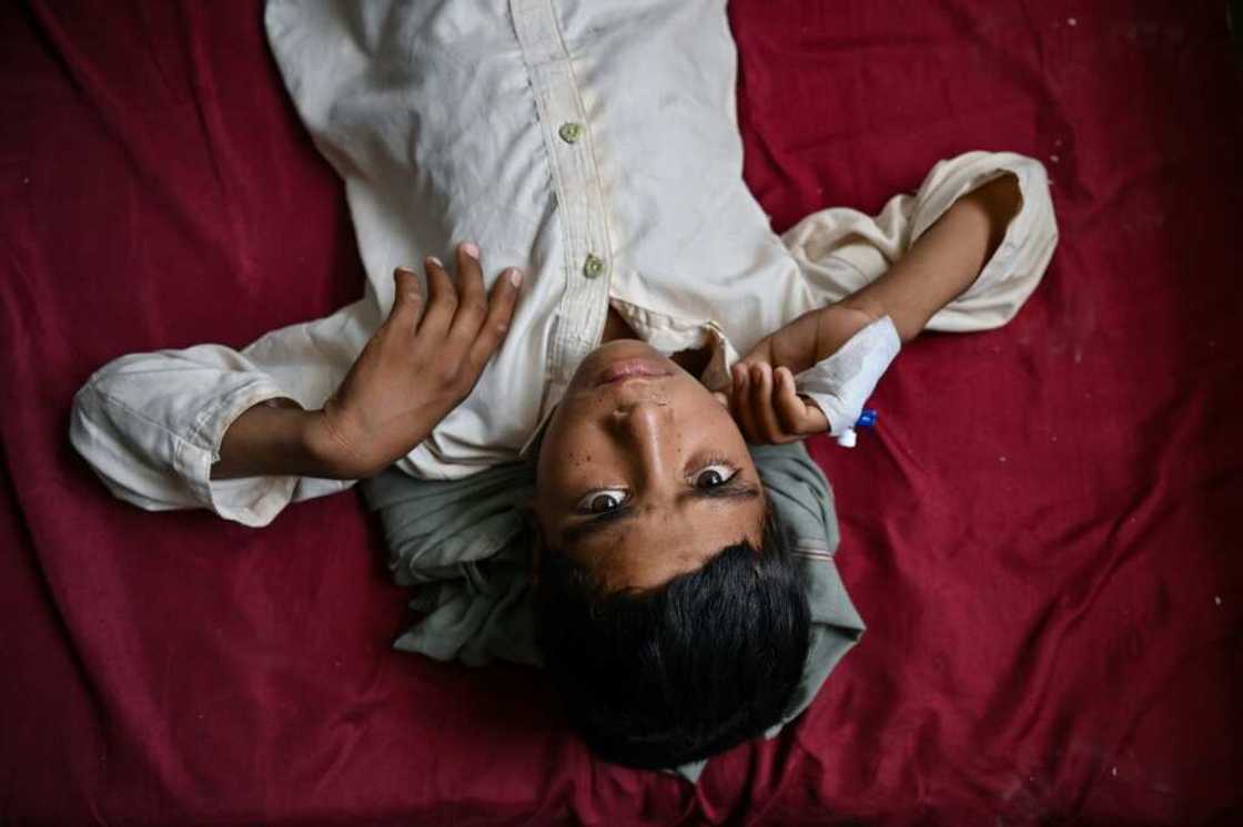 A young cholera patient rests in a ward at the Musa Qala District Hospital in Musa Qala, Helmand province A young cholera patient rests in a ward at the Musa Qala District Hospital in Musa Qala, Helmand province