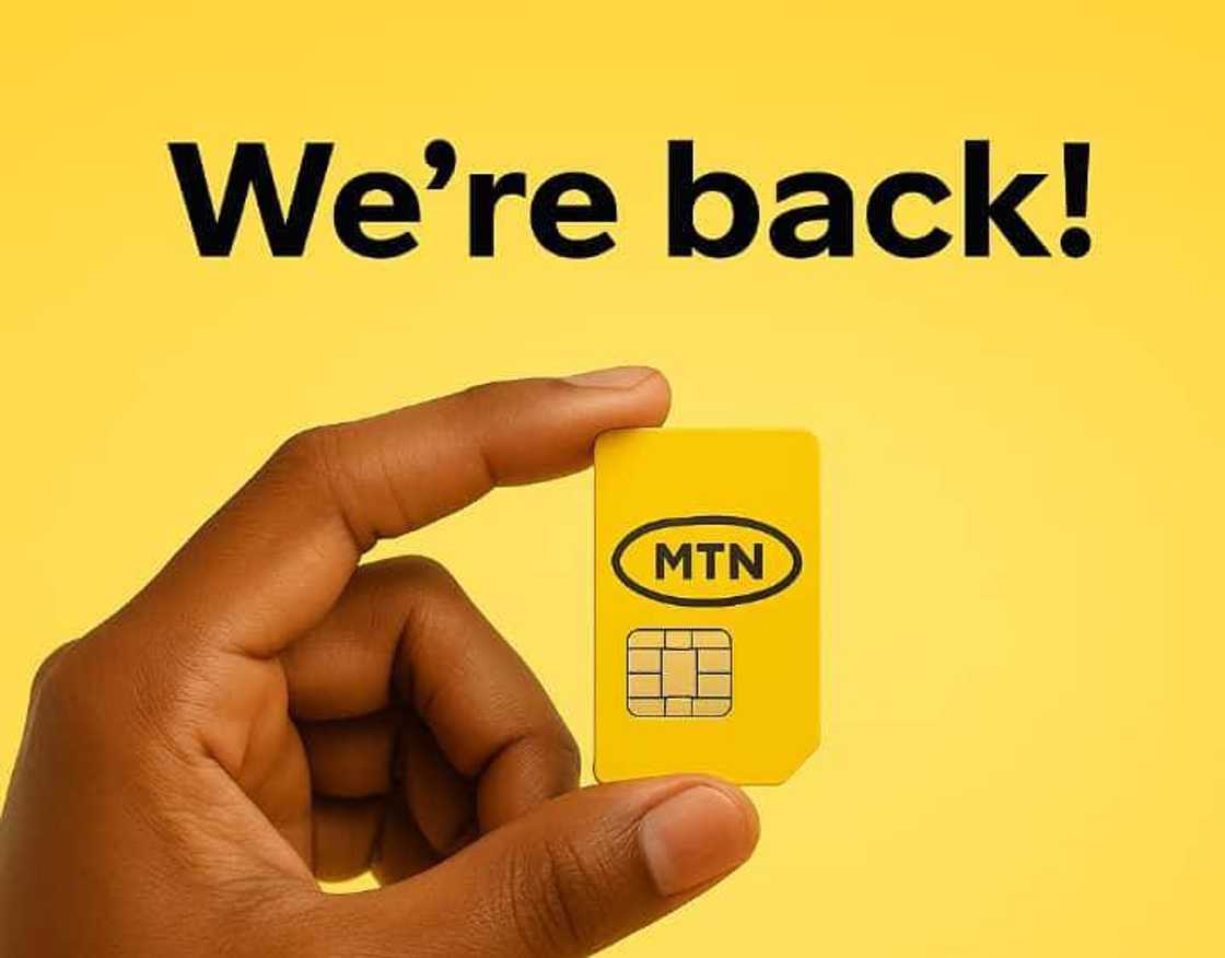 A hand holding an MTN SIM card A hand holding an MTN SIM card