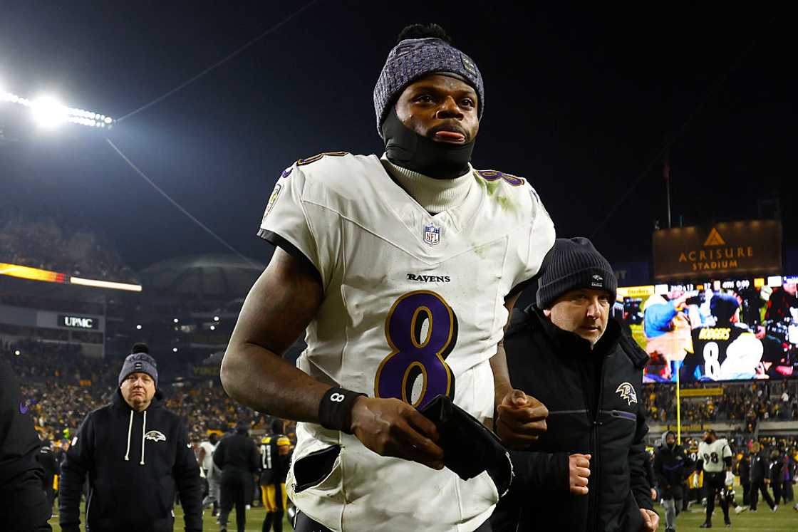 Lamar Jackson walks off the field