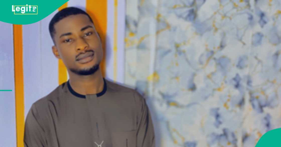 Nigerian man reacts after seeing a house roofed with firewood.