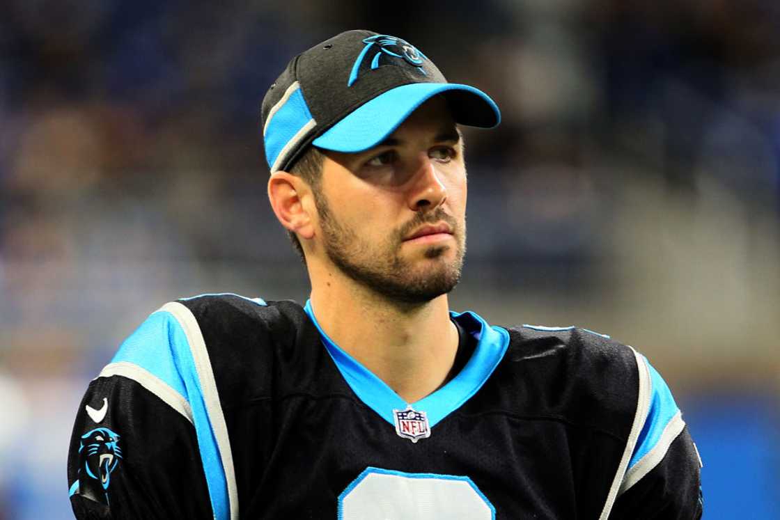 Graham Gano looks onto the field during warmups before an NFL football game against the Detroit Lions