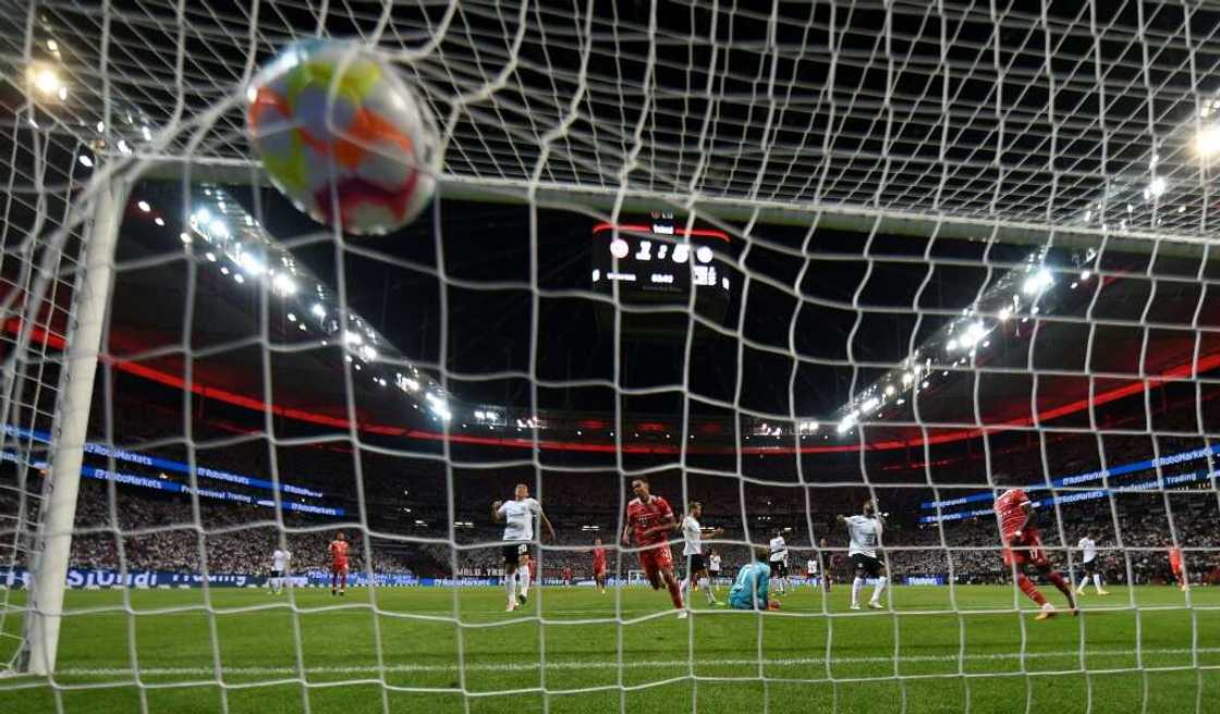 Net gain: Bayern Munich's German midfielder Jamal Musiala scores one of his two goals Net gain: Bayern Munich's German midfielder Jamal Musiala scores one of his two goals