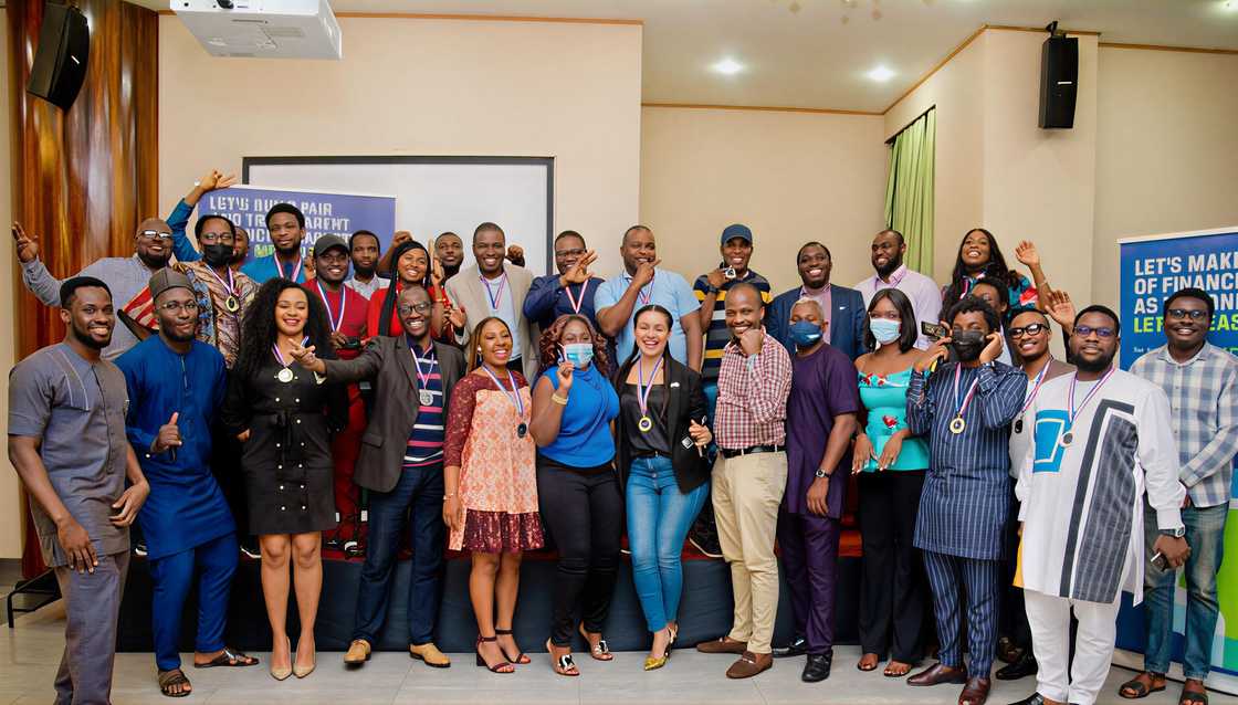 A group of young men and women with medals A group of young men and women with medals
