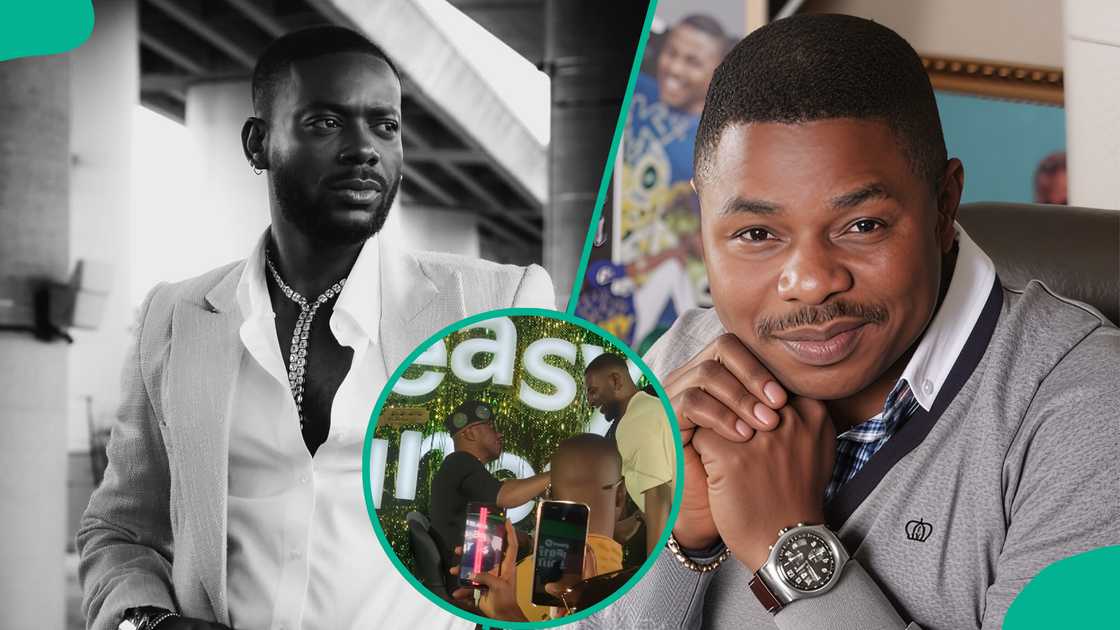 Adekunle Gold celebrates Yinka Ayefele on stage.