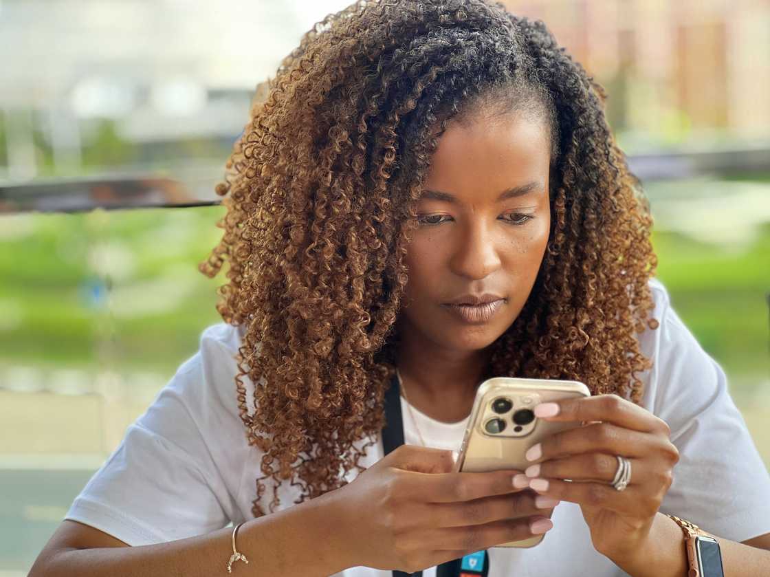 A woman checking her phone A woman checking her phone