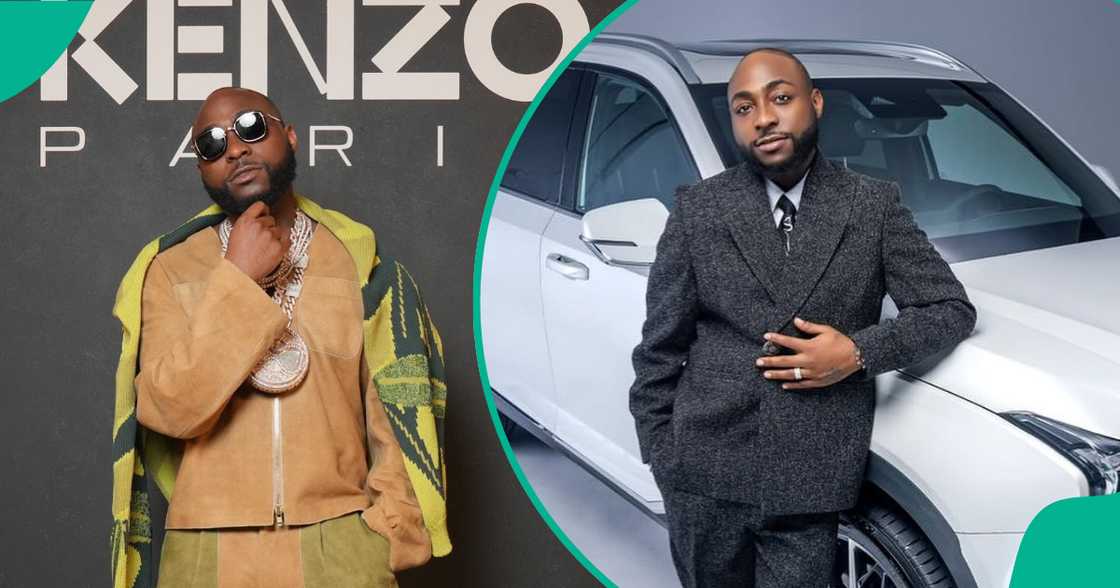 Davido seen being held by men after he alleged clashed with a fan on stage