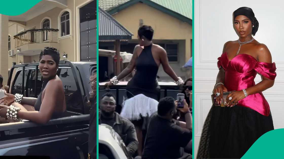 Afrobeats star Tiwa Savage spotted behind a pickup truck.