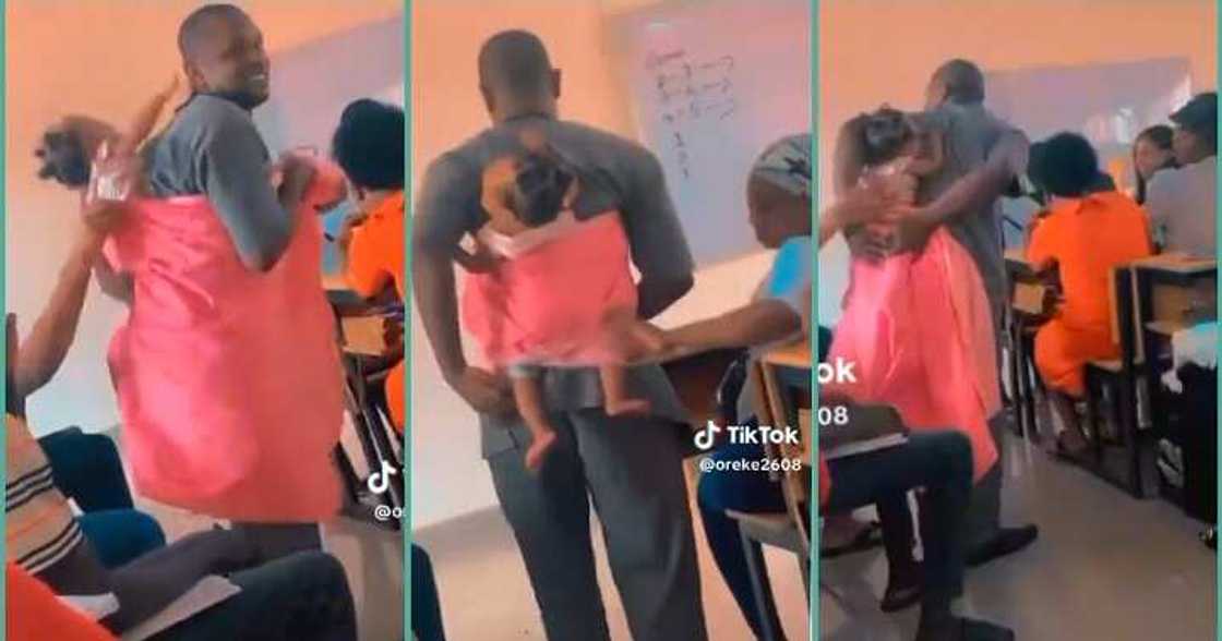 Lecturer carries female student's baby in class