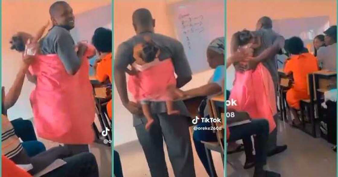 Lecturer carries female student's baby in class Lecturer carries female student's baby in class