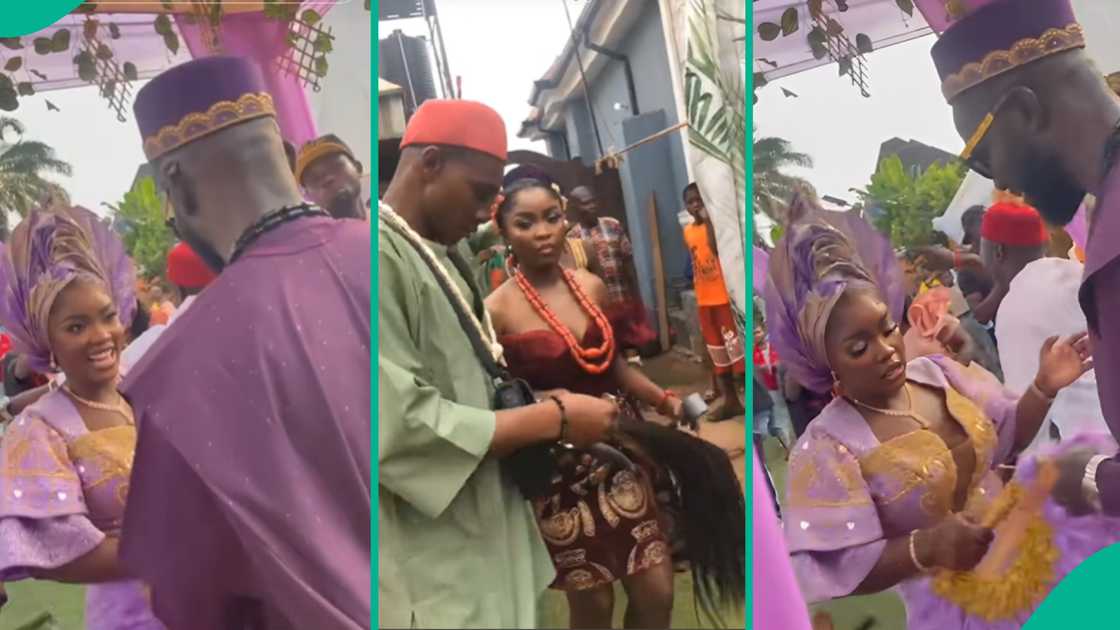 A bride quickly reacts as a guest does something suspicious to the groom during their wedding dance. A bride quickly reacts as a guest does something suspicious to the groom during their wedding dance.