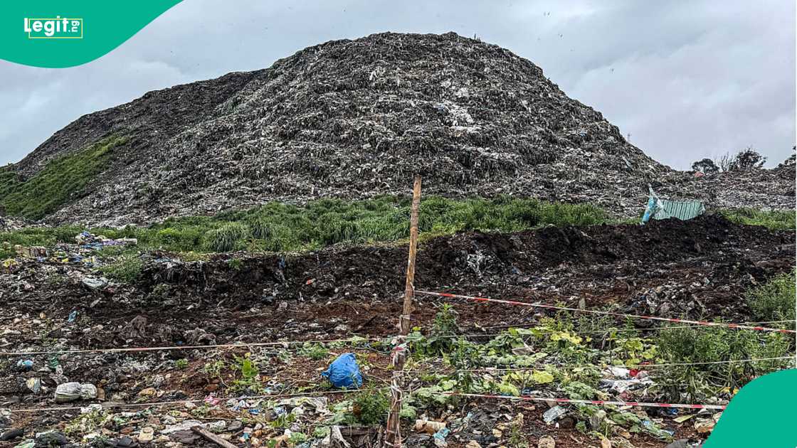 Local residents gather anxiously as authorities respond to the deadly waste site disaster. Local residents gather anxiously as authorities respond to the deadly waste site disaster.