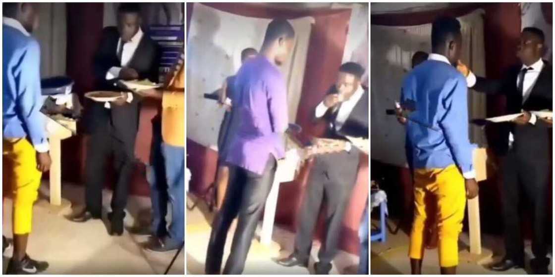 Reactions as 'pastor' takes eba, makes church members lick his finger as communion, video causes stir Reactions as 'pastor' takes eba, makes church members lick his finger as communion, video causes stir