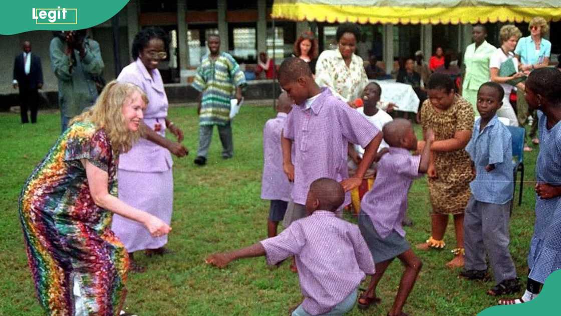 Actress Mia Farrow dances with handicapped children in Lagos. Actress Mia Farrow dances with handicapped children in Lagos.