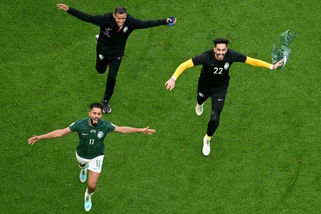 Saudi Arabia's players celebrate their shock World Cup win over Argentina