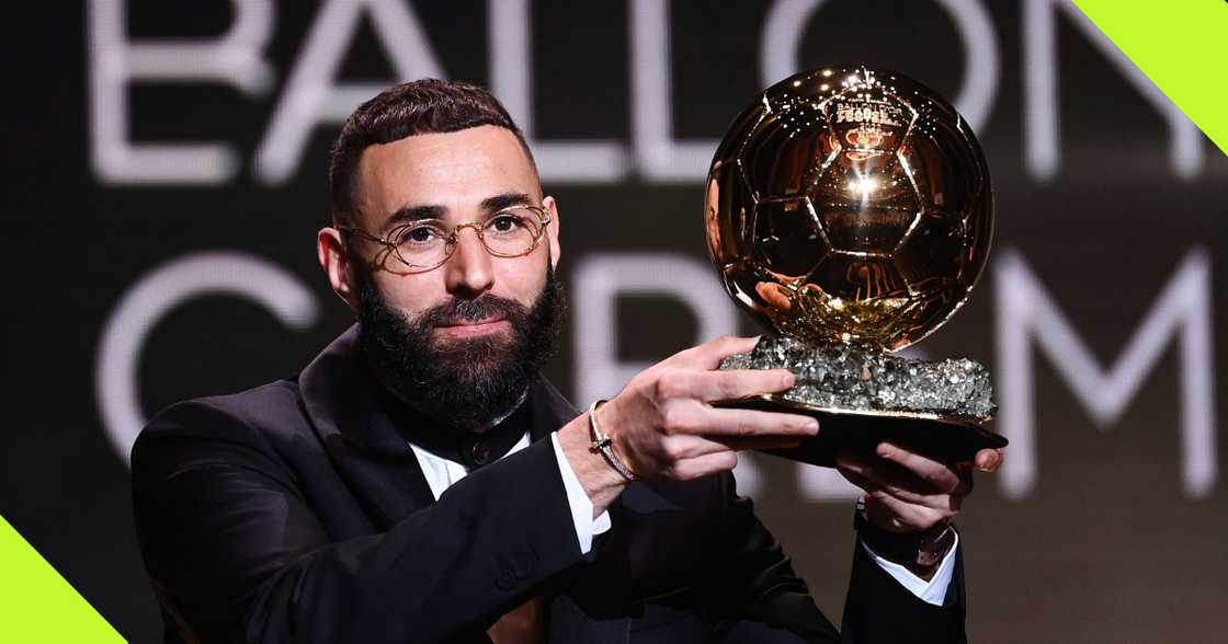 Karim Benzema with the Ballon d'Or award