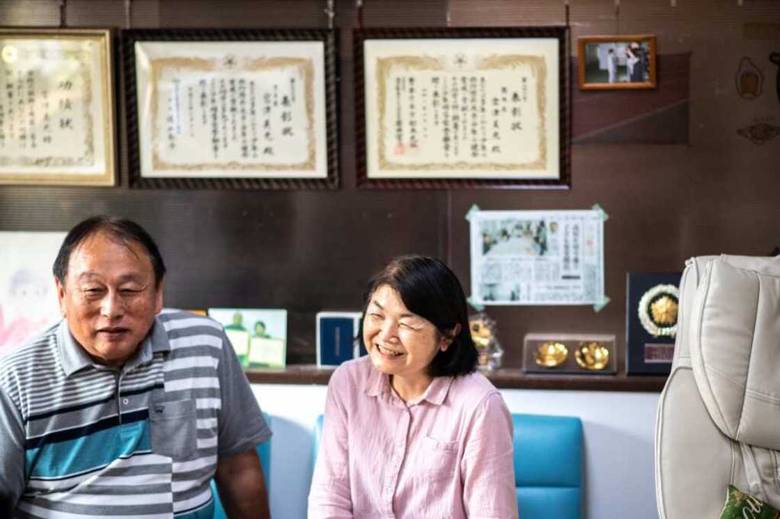 Yoshimitsu (L) and Midori Miyatsu, the adoptive parents of Koichi Miyatsu, have fostered more than 30 children Yoshimitsu (L) and Midori Miyatsu, the adoptive parents of Koichi Miyatsu, have fostered more than 30 children