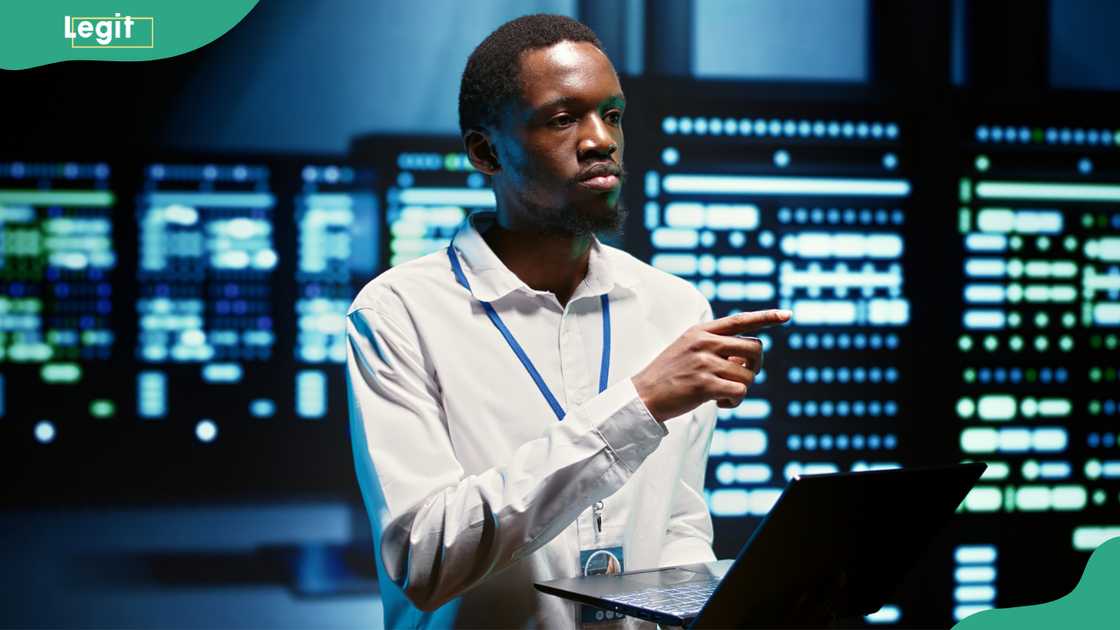 System administrator ensuring data centre servers are properly equipped System administrator ensuring data centre servers are properly equipped