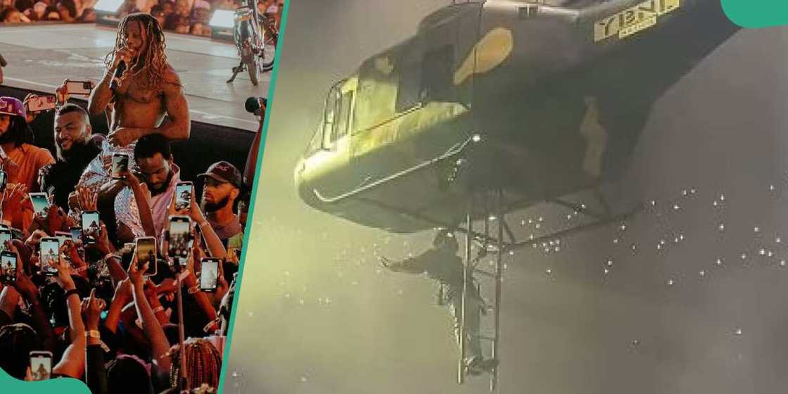 Photo of Asake as he drops on stage from a helicopter at 02 Arena Photo of Asake as he drops on stage from a helicopter at 02 Arena