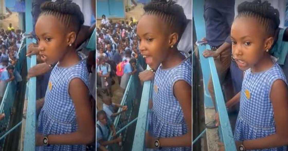 Little girl with great command of English speaks during assembly