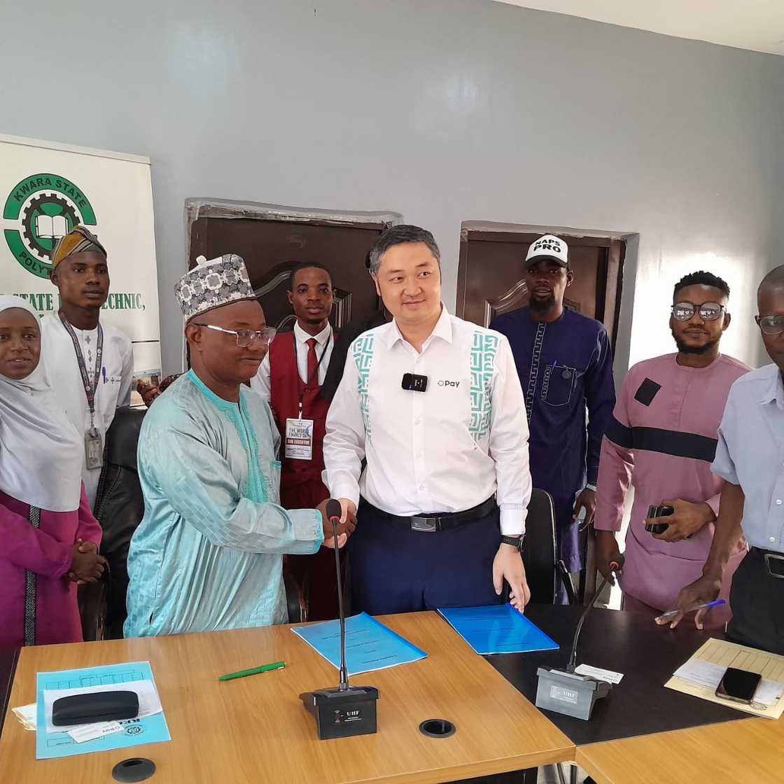 Kwara State Poly’s rector, Engr. Abdul Jimoh Mohammed, and OPay's chief public affairs Officer, Justin Zhang. Kwara State Poly’s rector, Engr. Abdul Jimoh Mohammed, and OPay's chief public affairs Officer, Justin Zhang.