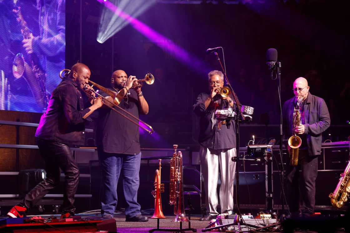 Trombone Shorty, Rashawn Ross, Jon Faddis, and Jeff Coffin of Dave Matthews Band at Madison Square Garden Trombone Shorty, Rashawn Ross, Jon Faddis, and Jeff Coffin of Dave Matthews Band at Madison Square Garden