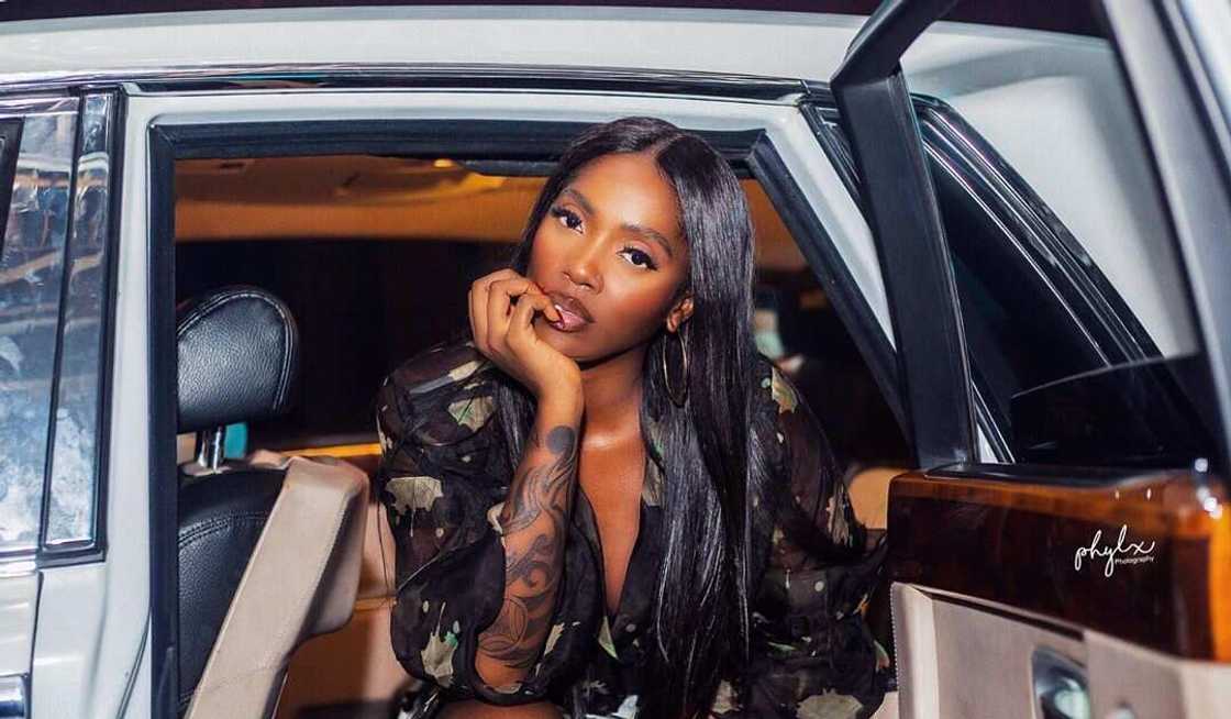 Tiwa Savage takes son Jamil on luxury shopping spree (video)