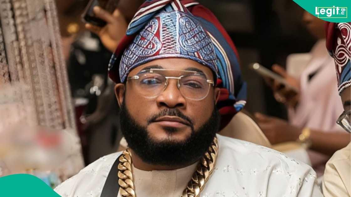 Sam Larry reacts to a videographer recording him outside Vein Lagos nightclub
