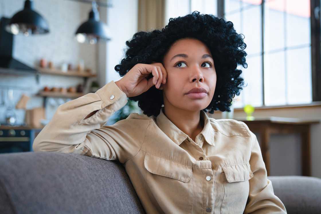 A woman thinking of relationships problems