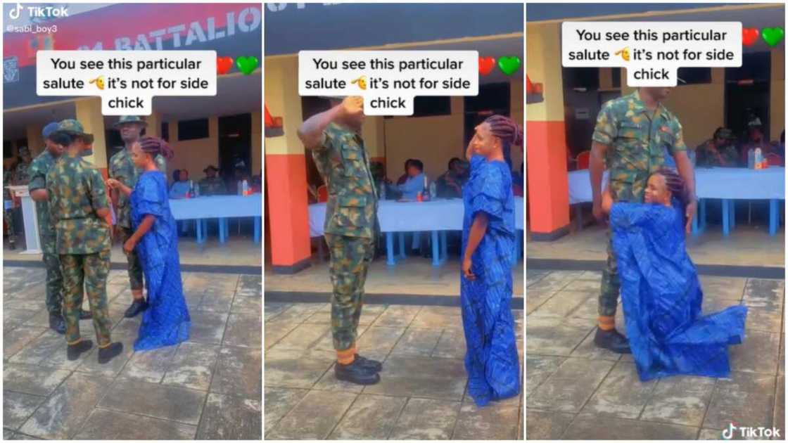 Soldier saluted his wife/woman knelt for husband. Soldier saluted his wife/woman knelt for husband.